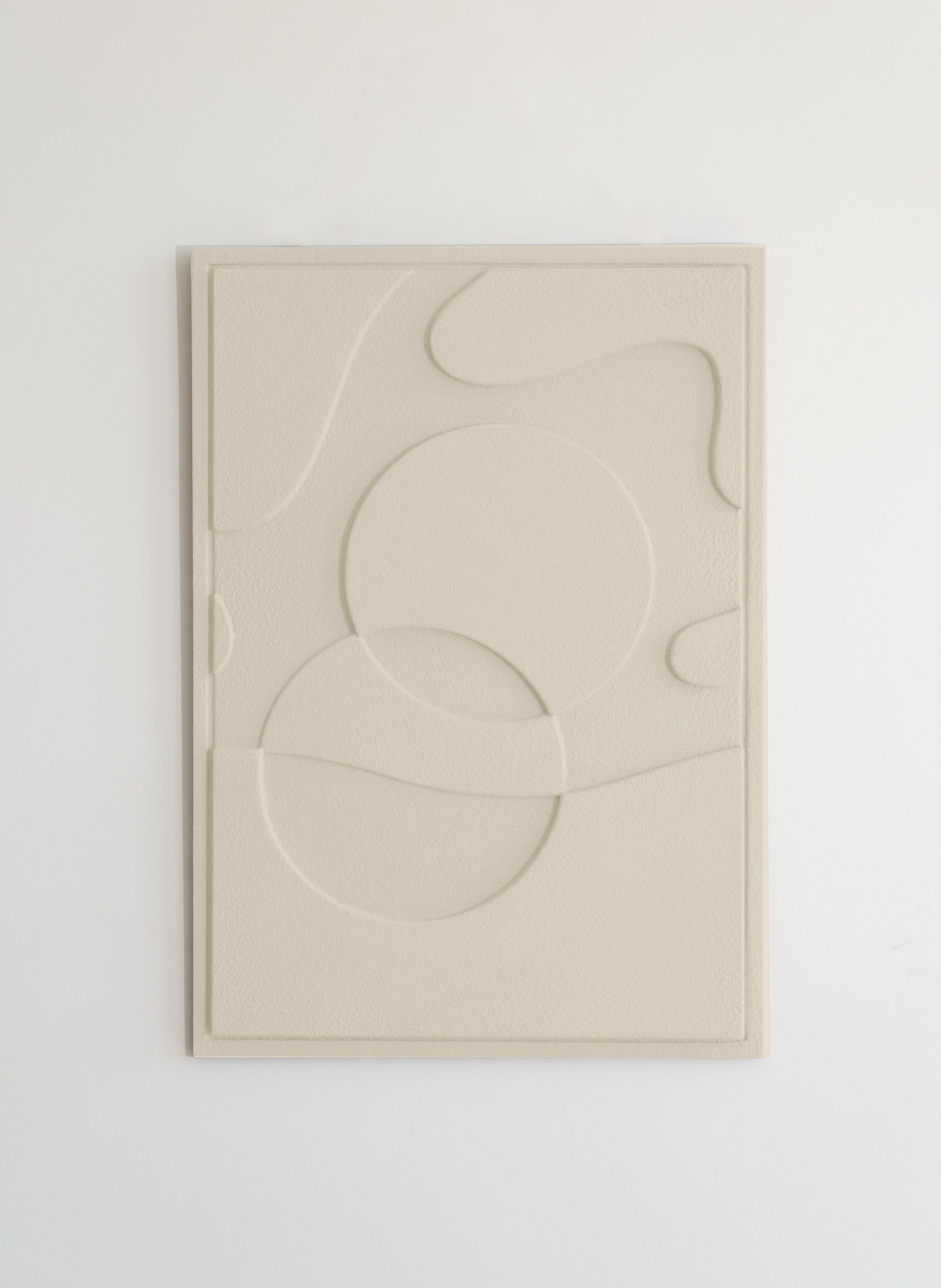 Handcrafted ETHER Relief - sustainable clay plaster wall art symbolizing harmony and universal connection.