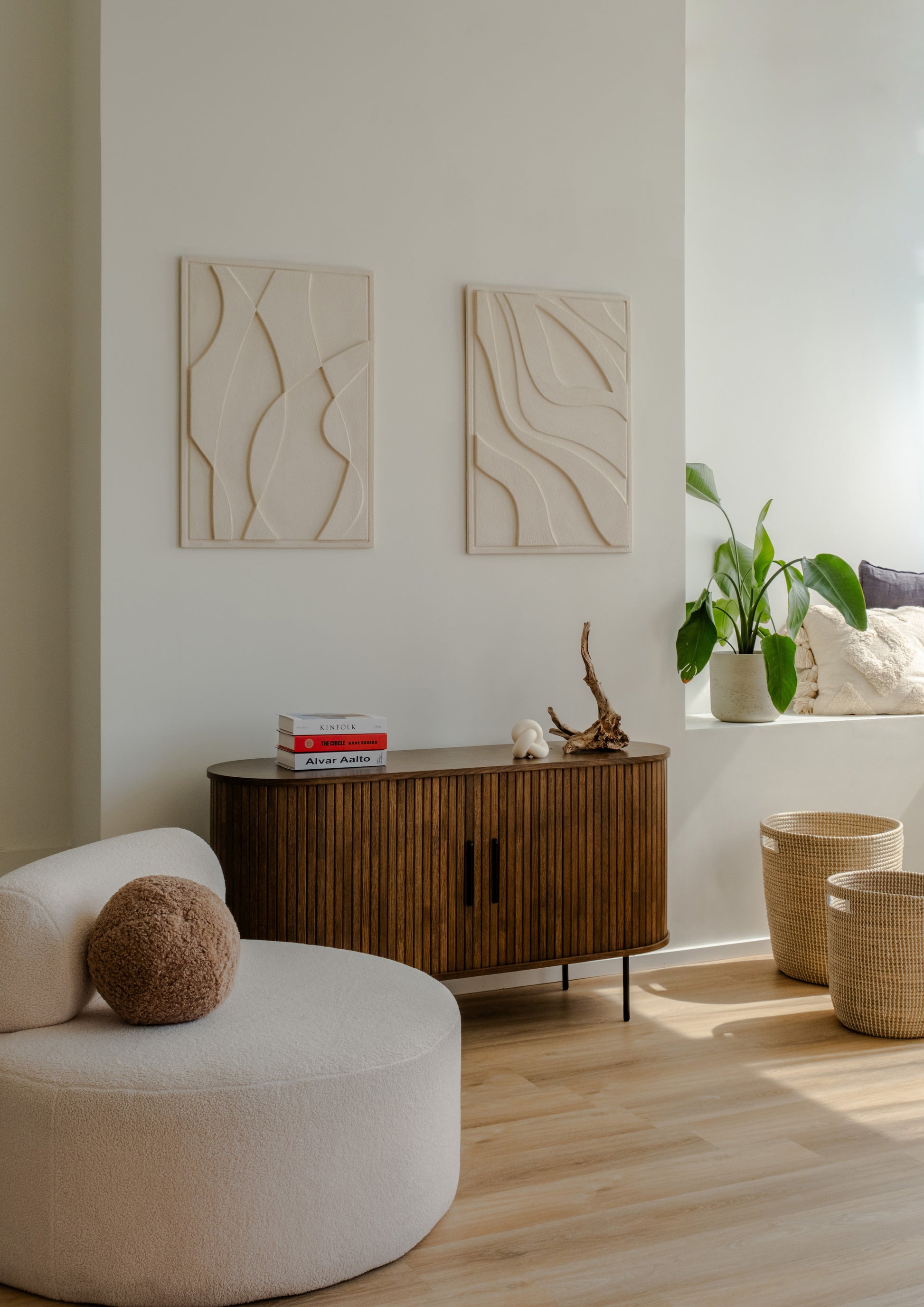 Handcrafted Water-inspired clay plaster wall art featuring soft, flowing wave patterns, made from sustainable, biodegradable materials for eco-friendly decor with a calming effect.